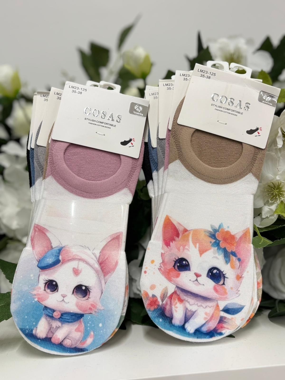 Armsad kassipildiga sokid